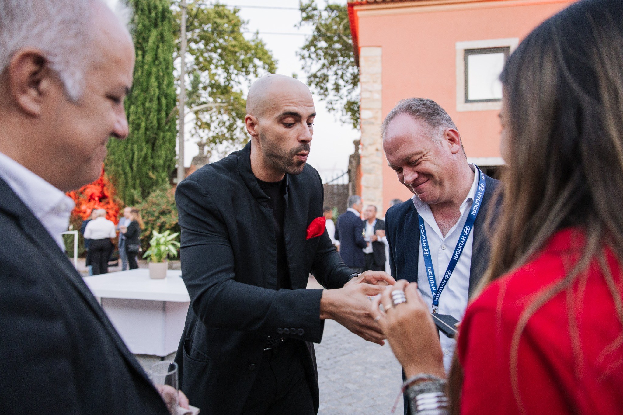 Aléxis Ricardo performing close-up magic at the Hyundai IONIQ 3 launch